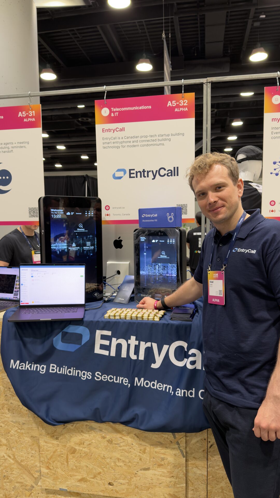 The EntryCall booth at Web Summit Vancouver — the resident app running live on every screen.